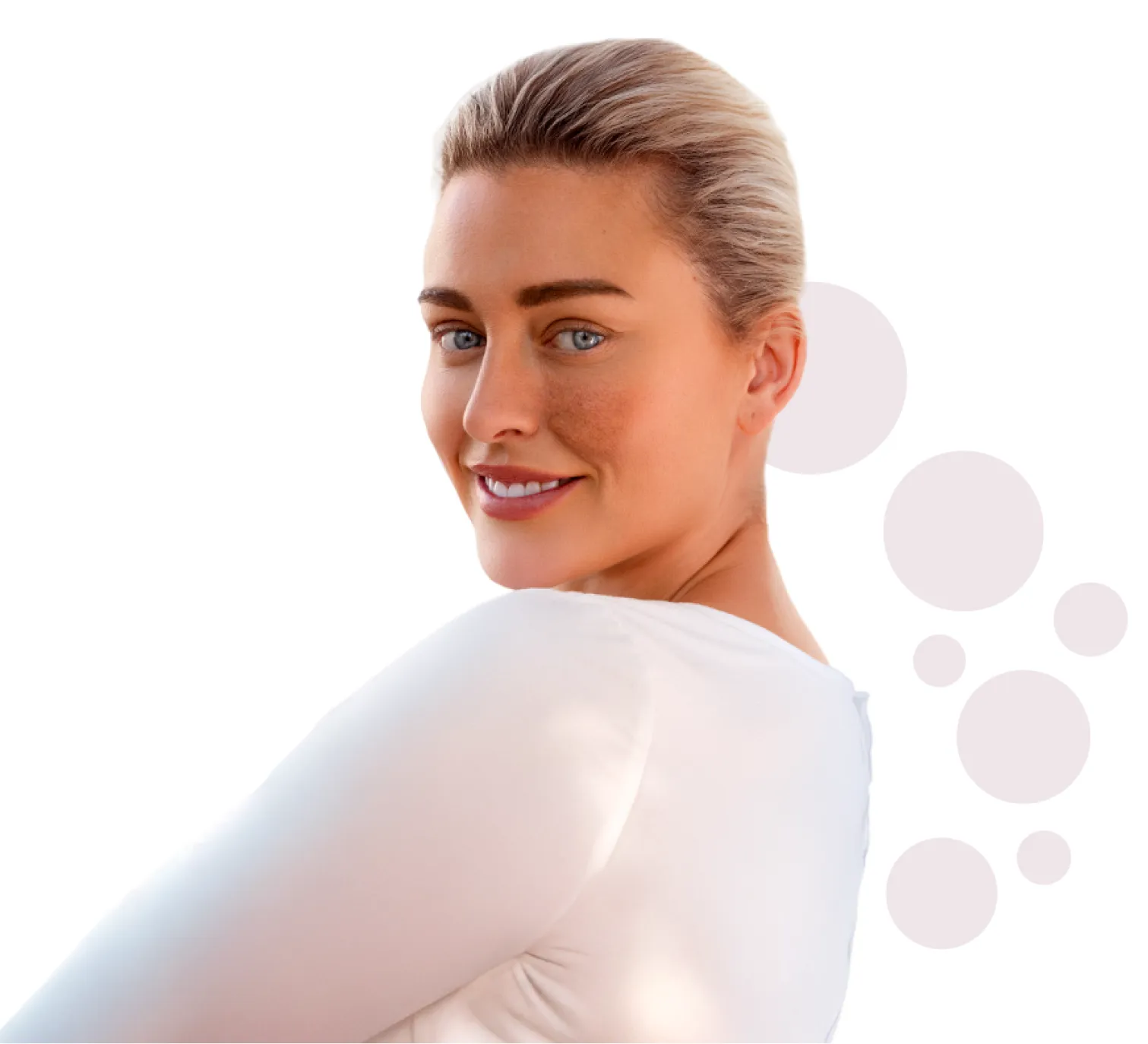 Smiling woman with smooth skin looking over her shoulder